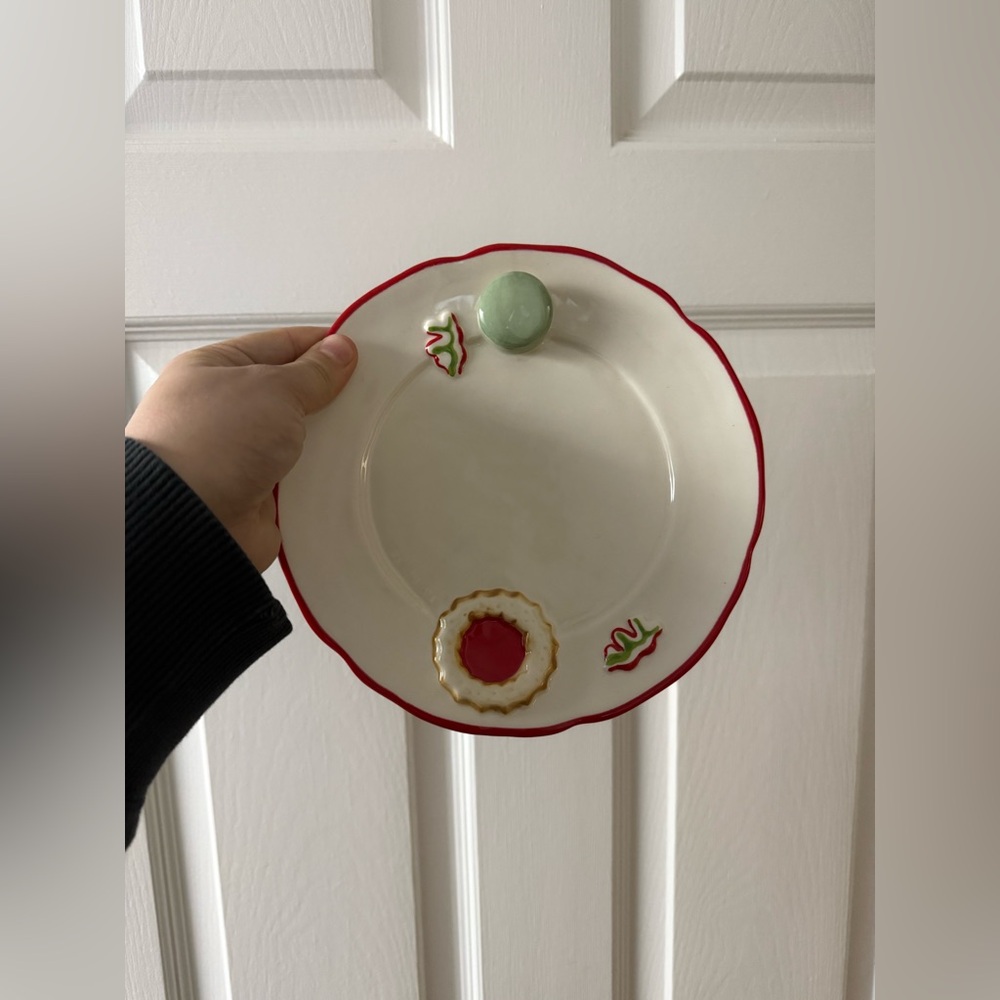 Festive White Plate with Red Trim and Holiday Accents